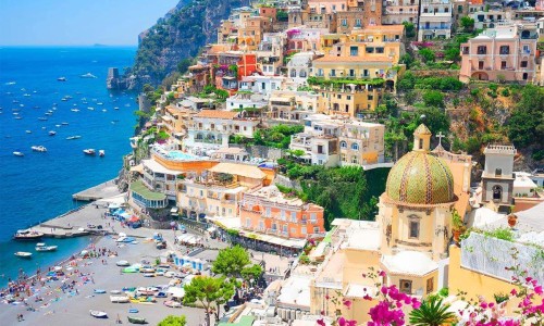 Naples coastline with boats in sunset view. Italy.